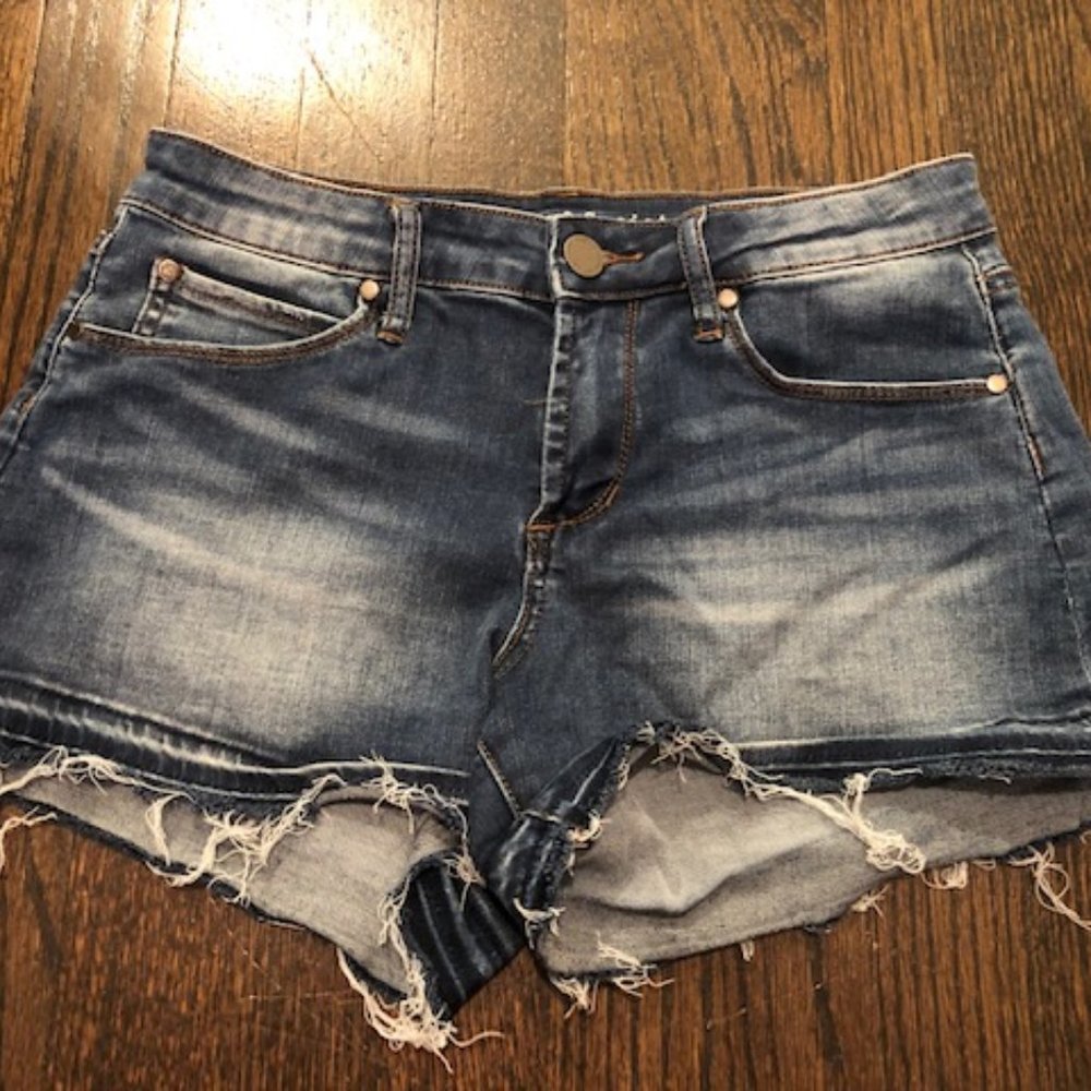 Distressed denim shorts